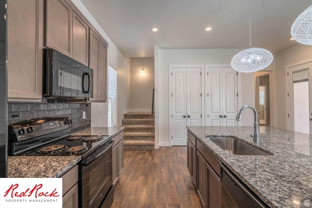 0, St. George, UT 84790 - kitchen featuring black appliances, a sink, dark wood-style floors, decorative backsplash, and baseboards