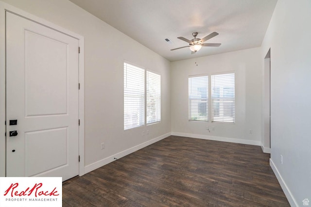 0, St. George, UT 84790 - spare room featuring dark wood-type flooring, ceiling fan, and baseboards