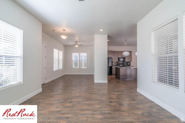 0, St. George, UT 84790 - unfurnished living room with a ceiling fan, dark wood finished floors, baseboards, and recessed lighting