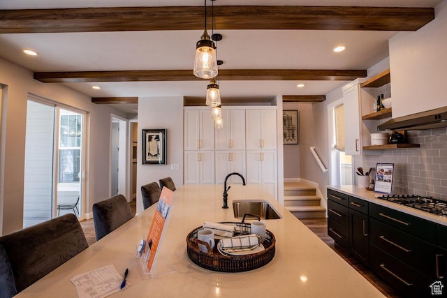 0, St. George, UT 84790 - kitchen featuring a sink, open shelves, white cabinetry, gas stovetop, and light countertops