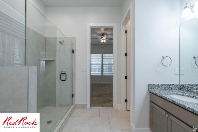 0, St. George, UT 84790 - full bathroom featuring tile patterned flooring, a shower stall, a ceiling fan, vanity, and baseboards