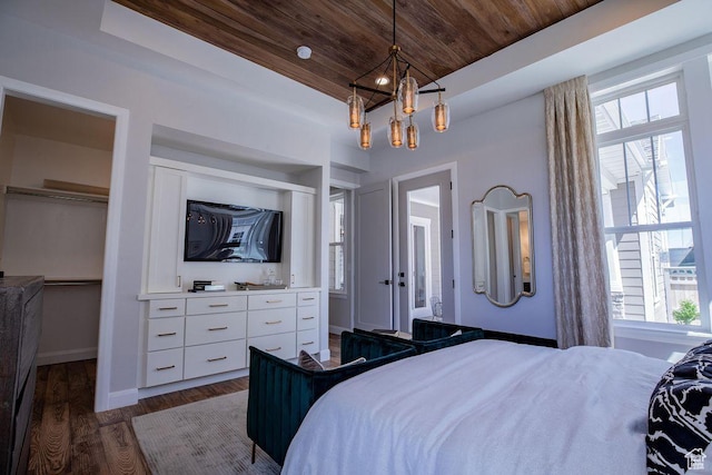 0, St. George, UT 84790 - bedroom with wooden ceiling, dark wood finished floors, a chandelier, and baseboards