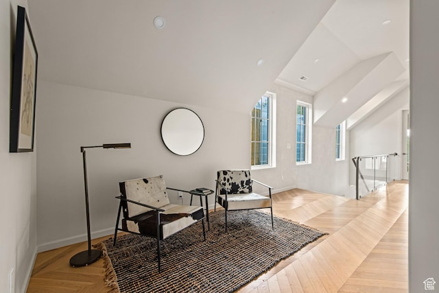 520 N H St E, Salt Lake City, UT 84103 - living area featuring an upstairs landing, baseboards, and vaulted ceiling