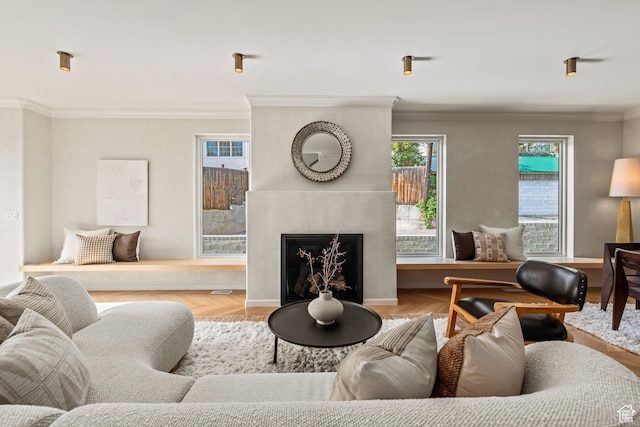 520 N H St E, Salt Lake City, UT 84103 - living room featuring crown molding, a fireplace, and baseboards