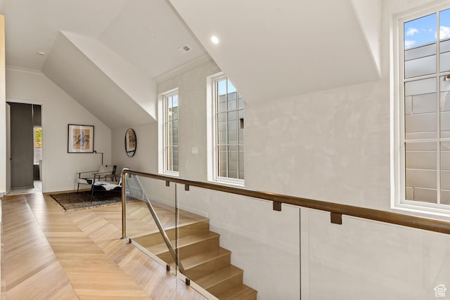 520 N H St E, Salt Lake City, UT 84103 - stairs featuring baseboards, lofted ceiling, and parquet flooring