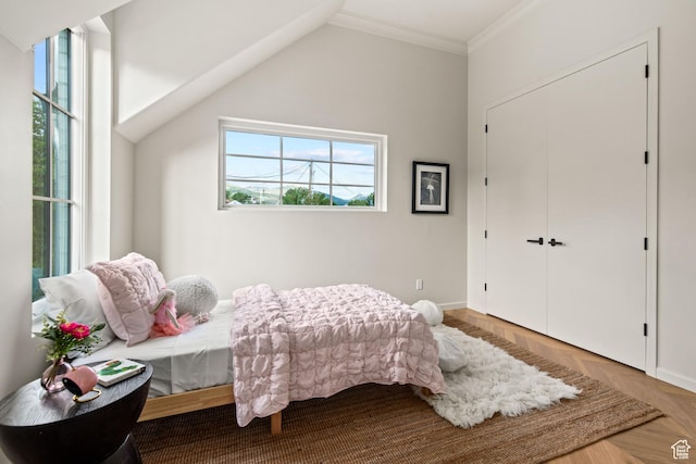 520 N H St E, Salt Lake City, UT 84103 - bedroom with crown molding, baseboards, and vaulted ceiling