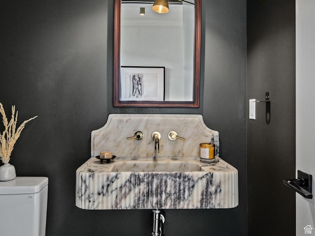 520 N H St E, Salt Lake City, UT 84103 - half bathroom featuring a sink and toilet
