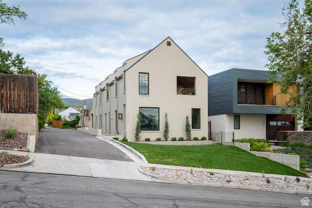 520 N H St E, Salt Lake City, UT 84103 - view of front of property with driveway and a front lawn