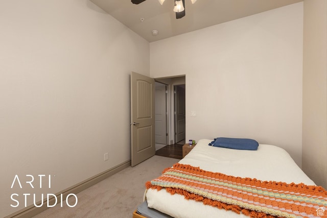 280 S Luce Del Sol Dr Unit 316, St George, UT 84770 - bedroom featuring carpet floors, a ceiling fan, baseboards, and a high ceiling