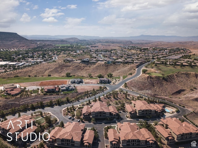 280 S Luce Del Sol Dr Unit 316, St George, UT 84770 - aerial overview of property's location with nearby suburban area and a mountain backdrop