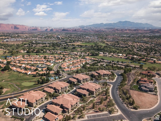 280 S Luce Del Sol Dr Unit 316, St George, UT 84770 - aerial view of property and surrounding area with a mountainous background and nearby suburban area