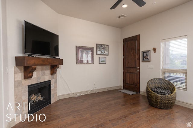 280 S Luce Del Sol Dr Unit 316, St George, UT 84770 - living area featuring wood finished floors, ceiling fan, a fireplace, and baseboards