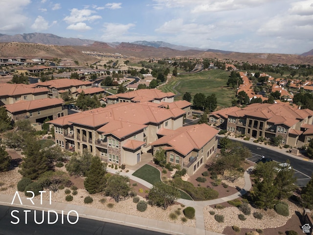 280 S Luce Del Sol Dr Unit 316, St George, UT 84770 - aerial view of property's location featuring a mountain backdrop and nearby suburban area
