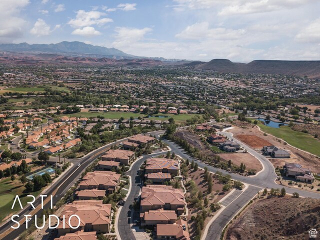 280 S Luce Del Sol Dr Unit 316, St George, UT 84770 - aerial view of property's location with nearby suburban area and a water and mountain view