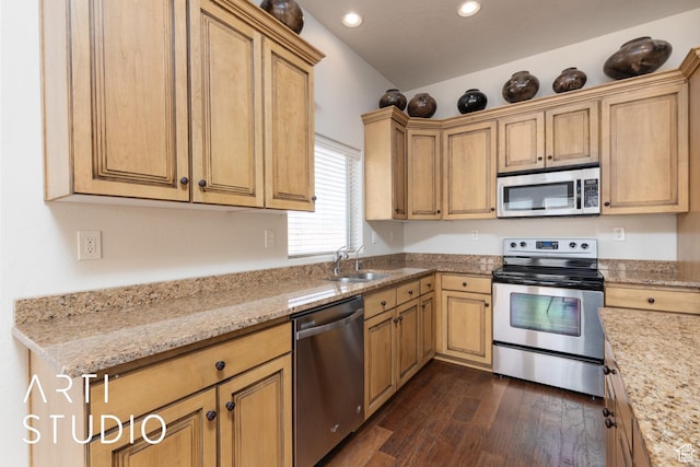 280 S Luce Del Sol Dr Unit 316, St George, UT 84770 - kitchen featuring appliances with stainless steel finishes, a sink, dark wood finished floors, recessed lighting, and light stone countertops