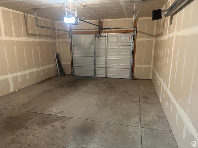 13092 S Tortola Dr Unit 101, Herriman, UT 84096 - garage with a garage door opener