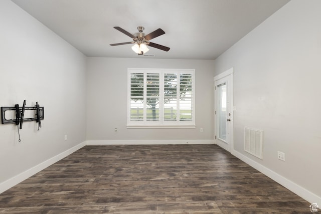 13092 S Tortola Dr Unit 101, Herriman, UT 84096 - spare room featuring a ceiling fan and dark wood-style flooring
