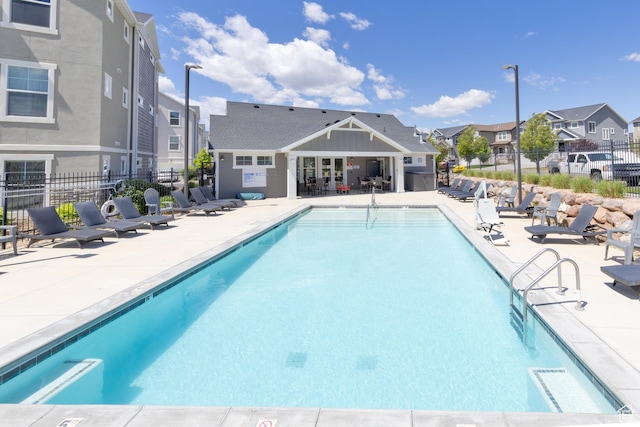 13092 S Tortola Dr Unit 101, Herriman, UT 84096 - community pool featuring a residential view and a patio