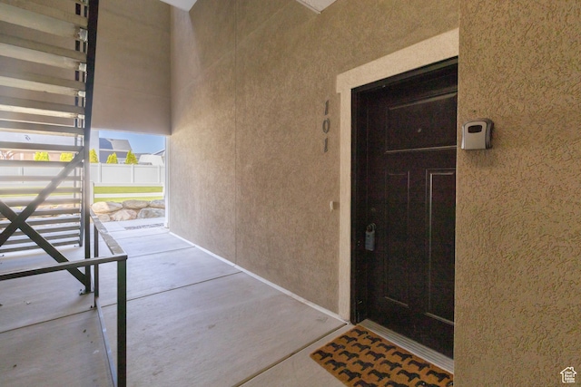 13092 S Tortola Dr Unit 101, Herriman, UT 84096 - doorway to property featuring stucco siding