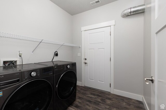 13092 S Tortola Dr Unit 101, Herriman, UT 84096 - washroom with washing machine and dryer and dark wood finished floors