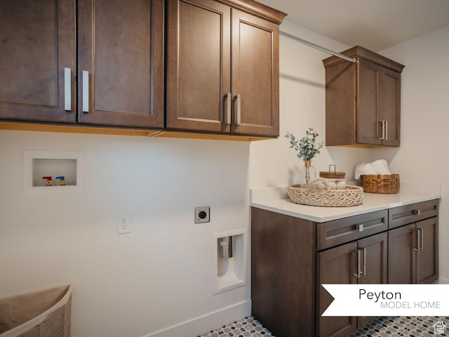 1549 W Boseman Way Unit 601, Saratoga Springs, UT 84045 - washroom with cabinet space, hookup for an electric dryer, hookup for a washing machine, and baseboards