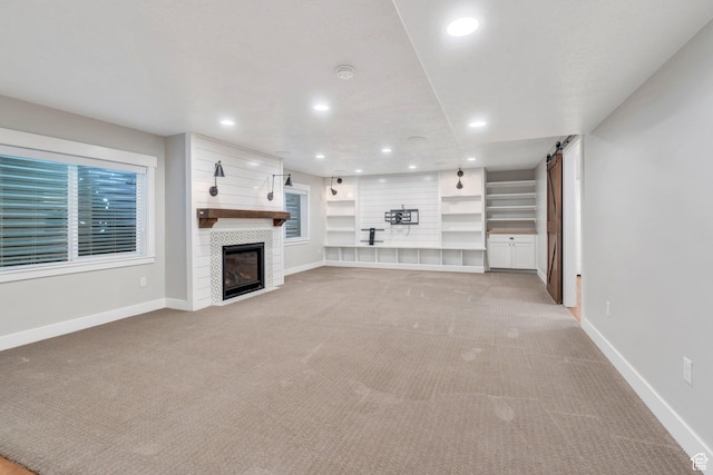 488 E Acord Way, Heber City, UT 84032 - unfurnished living room featuring light colored carpet, recessed lighting, baseboards, and a fireplace