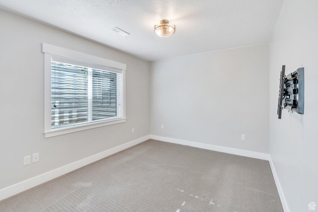 488 E Acord Way, Heber City, UT 84032 - empty room featuring carpet floors, baseboards, and a textured ceiling