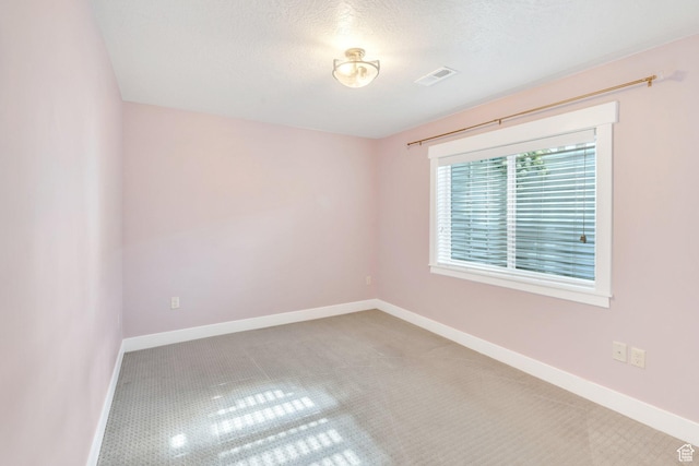 488 E Acord Way, Heber City, UT 84032 - spare room featuring baseboards, carpet, and a textured ceiling