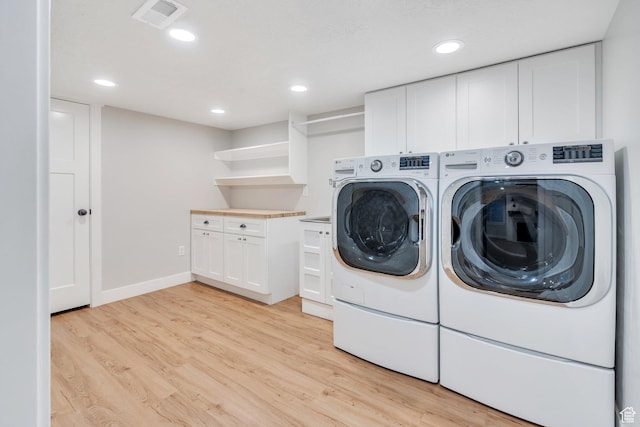 488 E Acord Way, Heber City, UT 84032 - washroom with washer and clothes dryer, light wood-style floors, recessed lighting, cabinet space, and baseboards