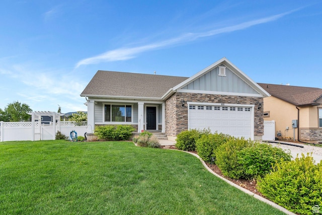 488 E Acord Way, Heber City, UT 84032 - view of front of home with stone siding, board and batten siding, a garage, driveway, and a pergola