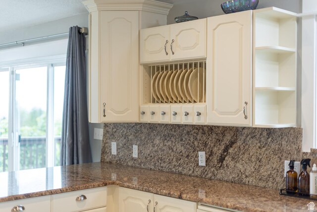304 N 1000 E, Hyde Park, UT 84318 - kitchen with open shelves, backsplash, and dark stone countertops