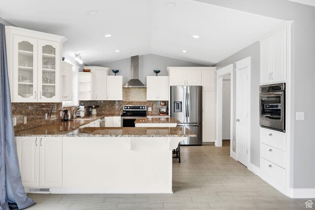 304 N 1000 E, Hyde Park, UT 84318 - kitchen featuring stainless steel appliances, wall chimney range hood, open shelves, a peninsula, and lofted ceiling