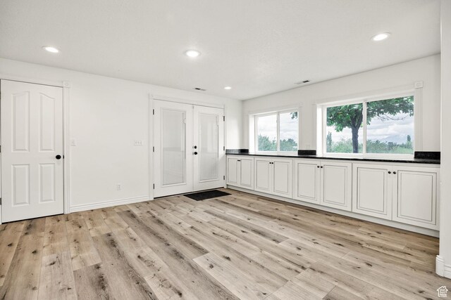304 N 1000 E, Hyde Park, UT 84318 - unfurnished bedroom with light wood-style floors, recessed lighting, and baseboards
