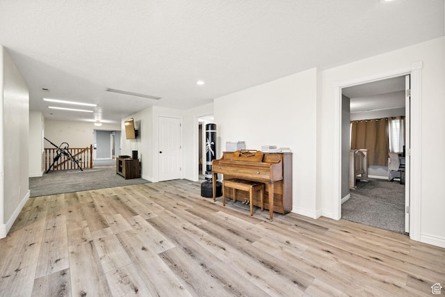 304 N 1000 E, Hyde Park, UT 84318 - living area with light wood-style floors, baseboards, and recessed lighting