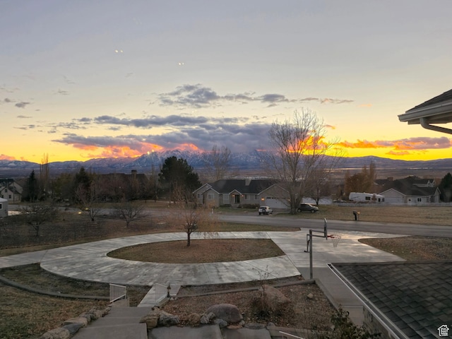 304 N 1000 E, Hyde Park, UT 84318 - yard at dusk featuring a mountain view
