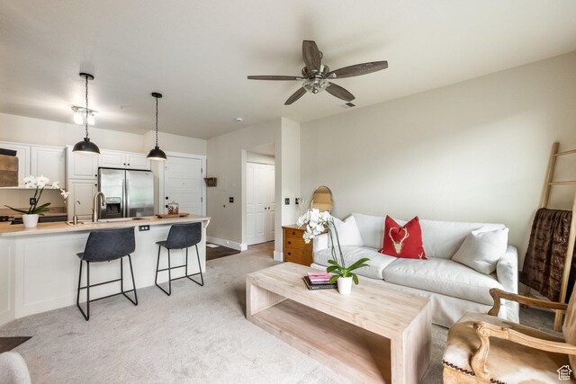 8430 Gambel Dr Unit Q23, Park City, UT 84098 - living area featuring a ceiling fan and light carpet