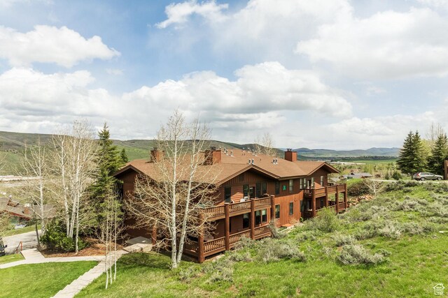 8430 Gambel Dr Unit Q23, Park City, UT 84098 - rear view of house featuring a chimney and a deck