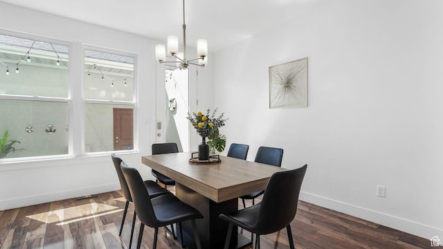 5241 W S Jordan Pkwy, South Jordan, UT 84009 - dining area featuring baseboards, a chandelier, wood finished floors, and healthy amount of natural light