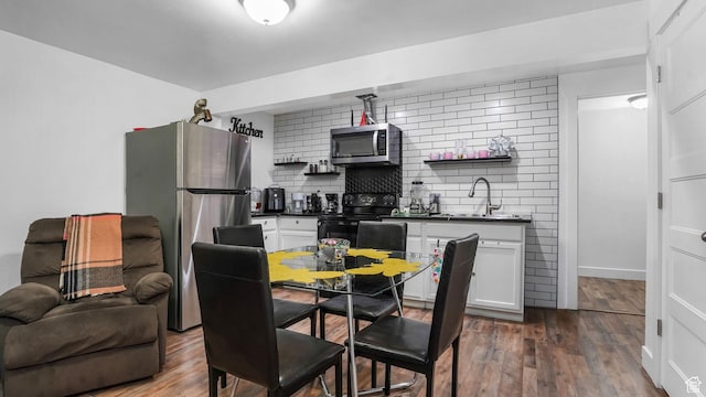 5241 W S Jordan Pkwy, South Jordan, UT 84009 - dining room with dark wood-style flooring