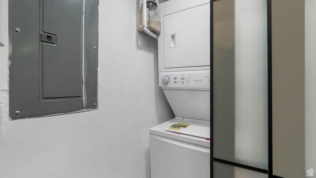 5241 W S Jordan Pkwy, South Jordan, UT 84009 - laundry room featuring stacked washer and clothes dryer and electric panel
