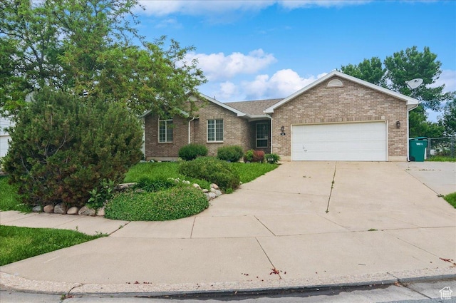 432 S 755 E, Layton, UT 84041 - ranch-style house featuring brick siding, driveway, and an attached garage