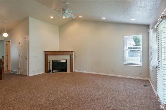 432 S 755 E, Layton, UT 84041 - unfurnished living room featuring carpet floors, ceiling fan, a tiled fireplace, baseboards, and high vaulted ceiling