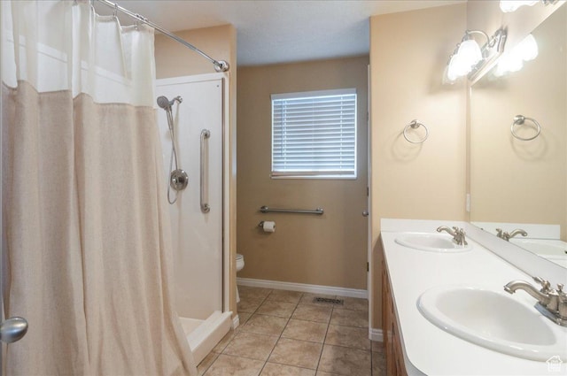 432 S 755 E, Layton, UT 84041 - full bathroom featuring baseboards, tile patterned floors, toilet, curtained shower, and double vanity