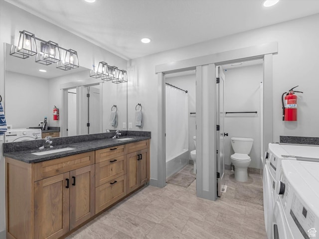 223 E 200 N, Ephraim, UT 84627 - full bath with washer and clothes dryer, toilet, double vanity, and recessed lighting