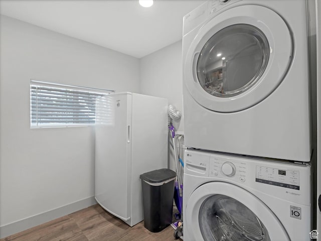 223 E 200 N, Ephraim, UT 84627 - laundry room featuring stacked washer / drying machine and wood finished floors
