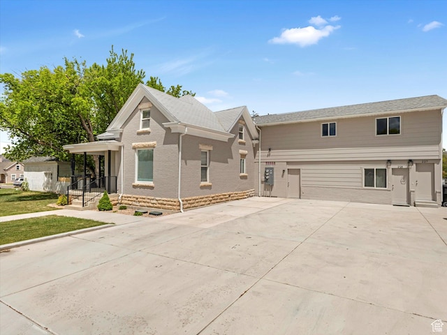 223 E 200 N, Ephraim, UT 84627 - view of front facade featuring driveway and brick siding