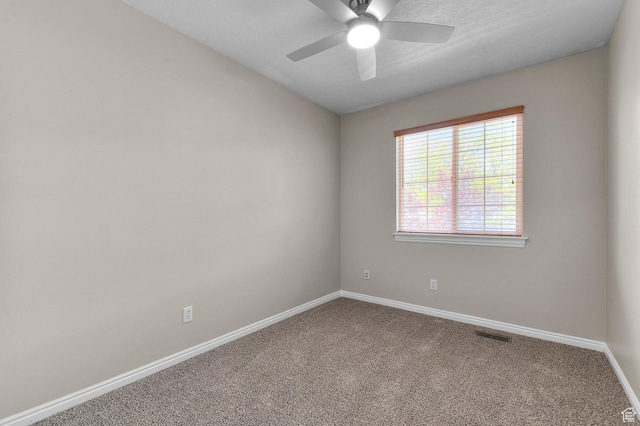 878 Independence Ave, Provo, UT 84604 - unfurnished room with carpet flooring, baseboards, and a ceiling fan