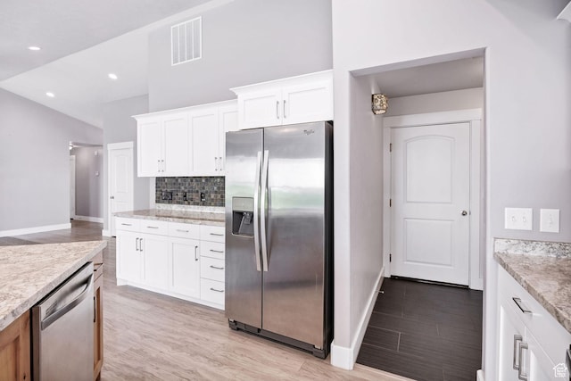 818 S 560 E, Providence, UT 84332 - kitchen featuring appliances with stainless steel finishes, baseboards, backsplash, light wood-type flooring, and recessed lighting
