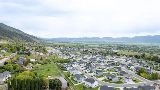818 S 560 E, Providence, UT 84332 - aerial overview of property's location featuring a mountain backdrop and nearby suburban area
