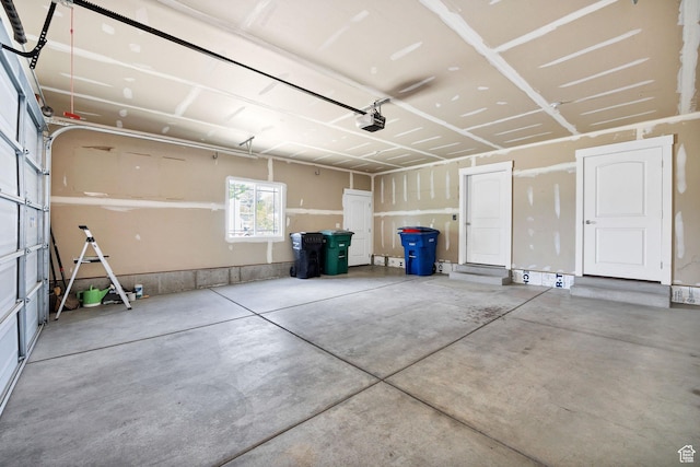 818 S 560 E, Providence, UT 84332 - garage featuring a garage door opener